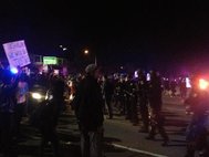 Протесты в США после оправдания полицейского, застрелившего подростка в Фергюсоне