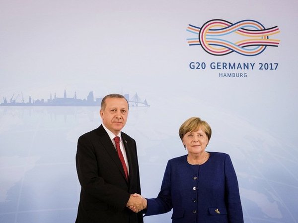 Президент Турции и канцлер Германии в день открытия саммита G20 в Гамбурге