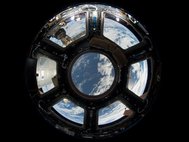 Вид на Землю из обзорного купола МКС. Фото: NASA