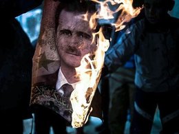 Сжигание портрета Башара Асада