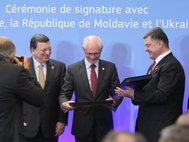 Жозе Мануэл Баррозу, Херман Ван Ромпей и Петр Порошенко в Брюсселе