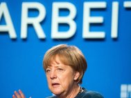 Ангела Меркель выступает на конференции перед немецкими рабочими