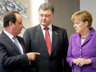 Франсуа Олланд, Петр Порошенко и Ангела Меркель в Минске