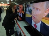 Изображение Путина в телевизоре