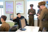 Ким Чен Ын дает руководящие указания при посещении фермы по выращиванию сомов