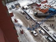 Упавший на жилой дом в Новосибирске кран