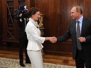 Анна Кузнецова на встрече с президентом РФ Влдимиром Путиным.