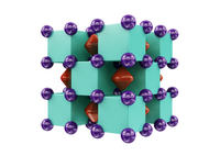Кристаллическая структура Na2He, напоминающая трёхмерную шахматную доску. Пурпурные шары показывают атомы натрия, а внутри зелёных кубов находятся атомы гелия. Красные области внутри пустот показывают области, в которых локализованы электронные пары