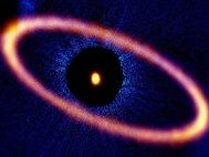 Композитное изображение звездной системы Фомальгаут. Диск космической пыли обозначен оранжевым