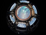Вид на Землю из купола Международной космической станции