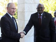 Президент РФ Владимир Путин и президент Судана Омар Башир