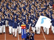Спортсмены КНДР и Южной Кореи под единым флагом в 2002 году