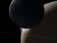 Энцелад на фоне Сатурна
