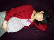 Беременная китайская женщина