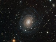 Снимок спиральной галактики NGC 6902, сделанный телескопом Ганимед