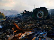 Скамолет Боинг-777 сбытый над Донбассом