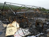 Последствия пожара в палаточном лагере в Хабаровском крае