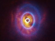 Изображения GW Ori, полученные на ALMA и SPHERE (наложение)